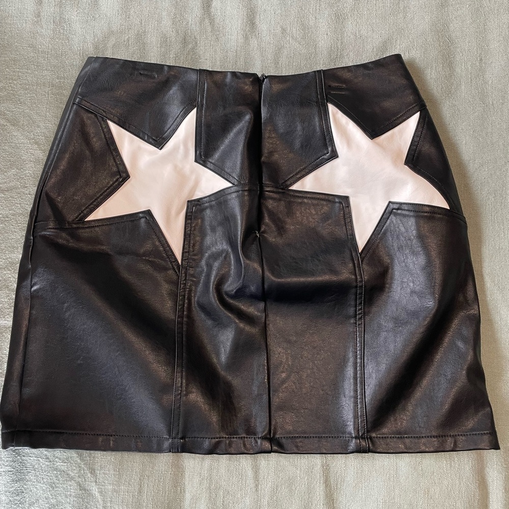 Black leather skirt with stars on back